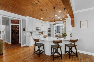 This stunning luxury home at 4027 Hickory Fairway Drive on The Golf Club At Bradshaw Farm in Georgia - for sale on GolfHomes.com, golf home, golf lot