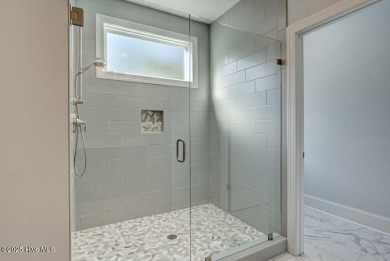 This beautiful 3BR/3.5BA custom built home by Greenwatch on Lockwood Folly Country Club in North Carolina - for sale on GolfHomes.com, golf home, golf lot