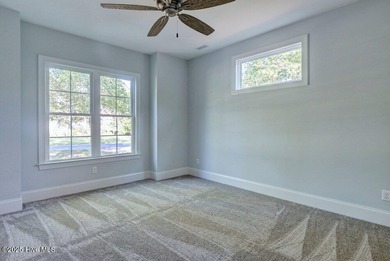 This beautiful 3BR/3.5BA custom built home by Greenwatch on Lockwood Folly Country Club in North Carolina - for sale on GolfHomes.com, golf home, golf lot