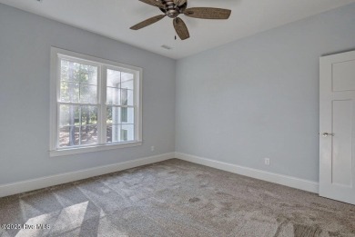 This beautiful 3BR/3.5BA custom built home by Greenwatch on Lockwood Folly Country Club in North Carolina - for sale on GolfHomes.com, golf home, golf lot
