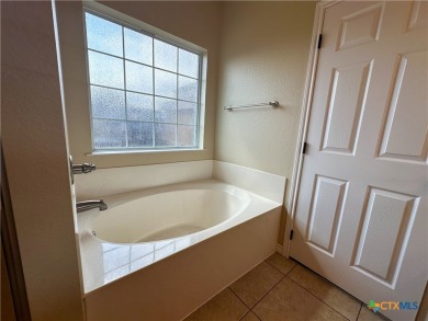 Beautiful custom 4BD/2BA home located just a golf cart ride away on Gatesville Country Club in Texas - for sale on GolfHomes.com, golf home, golf lot