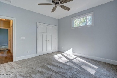 This beautiful 3BR/3.5BA custom built home by Greenwatch on Lockwood Folly Country Club in North Carolina - for sale on GolfHomes.com, golf home, golf lot