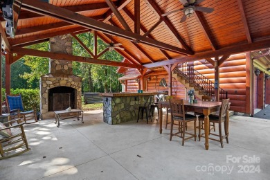 Discover this exceptional 1.5-story log home nestled in a on Lake Louise Golf Club in North Carolina - for sale on GolfHomes.com, golf home, golf lot