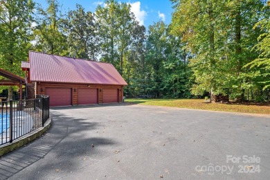 Discover this exceptional 1.5-story log home nestled in a on Lake Louise Golf Club in North Carolina - for sale on GolfHomes.com, golf home, golf lot