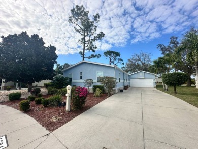 Beautiful stucco home on a quiet cul de sac. Tastefully updated on Del Tura Golf and Country Club in Florida - for sale on GolfHomes.com, golf home, golf lot