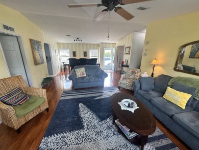 Beautiful stucco home on a quiet cul de sac. Tastefully updated on Del Tura Golf and Country Club in Florida - for sale on GolfHomes.com, golf home, golf lot
