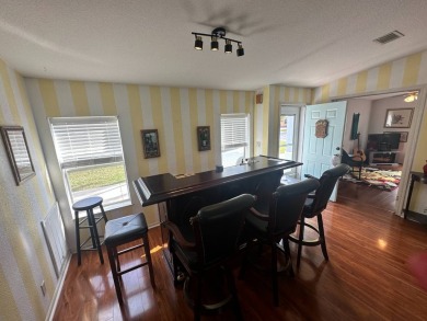 Beautiful stucco home on a quiet cul de sac. Tastefully updated on Del Tura Golf and Country Club in Florida - for sale on GolfHomes.com, golf home, golf lot