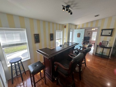 Beautiful stucco home on a quiet cul de sac. Tastefully updated on Del Tura Golf and Country Club in Florida - for sale on GolfHomes.com, golf home, golf lot