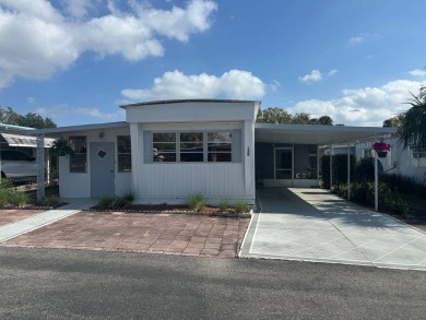 This has been the winter home for the sellers for over 20 years on Bay Tree Golf Course in Florida - for sale on GolfHomes.com, golf home, golf lot