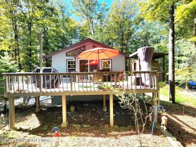 Experience the ultimate POCONO RETREAT!! This stunning raised on The Hideout Golf in Pennsylvania - for sale on GolfHomes.com, golf home, golf lot