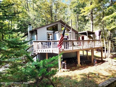 Experience the ultimate POCONO RETREAT!! This stunning raised on The Hideout Golf in Pennsylvania - for sale on GolfHomes.com, golf home, golf lot