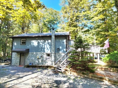 Experience the ultimate POCONO RETREAT!! This stunning raised on The Hideout Golf in Pennsylvania - for sale on GolfHomes.com, golf home, golf lot