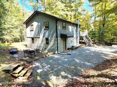 Experience the ultimate POCONO RETREAT!! This stunning raised on The Hideout Golf in Pennsylvania - for sale on GolfHomes.com, golf home, golf lot