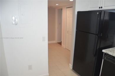 Experience serenity in this stunning 1-bedroom, 1-bathroom on Jacaranda Golf Club in Florida - for sale on GolfHomes.com, golf home, golf lot