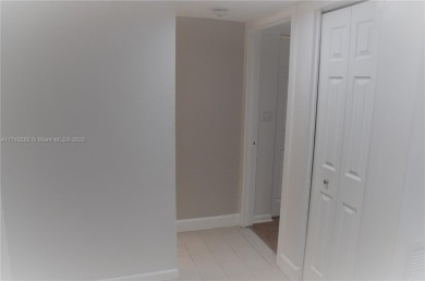 Experience serenity in this stunning 1-bedroom, 1-bathroom on Jacaranda Golf Club in Florida - for sale on GolfHomes.com, golf home, golf lot