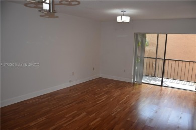 Experience serenity in this stunning 1-bedroom, 1-bathroom on Jacaranda Golf Club in Florida - for sale on GolfHomes.com, golf home, golf lot