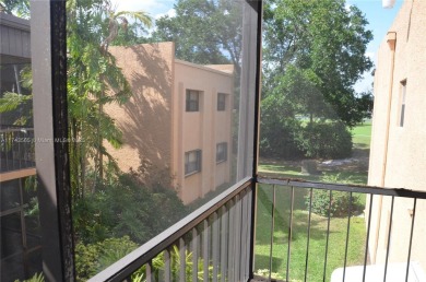 Experience serenity in this stunning 1-bedroom, 1-bathroom on Jacaranda Golf Club in Florida - for sale on GolfHomes.com, golf home, golf lot