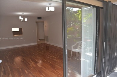 Experience serenity in this stunning 1-bedroom, 1-bathroom on Jacaranda Golf Club in Florida - for sale on GolfHomes.com, golf home, golf lot