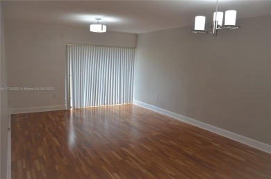 Experience serenity in this stunning 1-bedroom, 1-bathroom on Jacaranda Golf Club in Florida - for sale on GolfHomes.com, golf home, golf lot