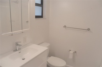 Experience serenity in this stunning 1-bedroom, 1-bathroom on Jacaranda Golf Club in Florida - for sale on GolfHomes.com, golf home, golf lot
