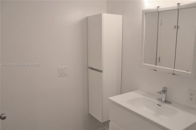 Experience serenity in this stunning 1-bedroom, 1-bathroom on Jacaranda Golf Club in Florida - for sale on GolfHomes.com, golf home, golf lot