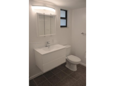 Experience serenity in this stunning 1-bedroom, 1-bathroom on Jacaranda Golf Club in Florida - for sale on GolfHomes.com, golf home, golf lot