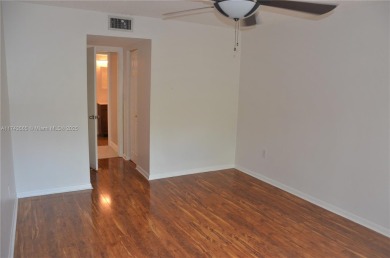 Experience serenity in this stunning 1-bedroom, 1-bathroom on Jacaranda Golf Club in Florida - for sale on GolfHomes.com, golf home, golf lot