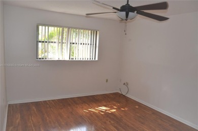 Experience serenity in this stunning 1-bedroom, 1-bathroom on Jacaranda Golf Club in Florida - for sale on GolfHomes.com, golf home, golf lot