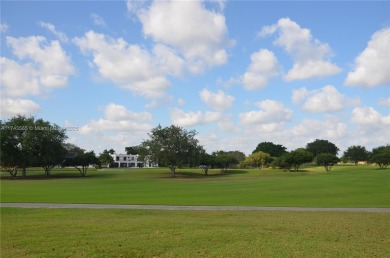 Experience serenity in this stunning 1-bedroom, 1-bathroom on Jacaranda Golf Club in Florida - for sale on GolfHomes.com, golf home, golf lot