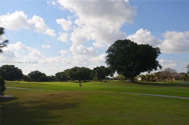 Experience serenity in this stunning 1-bedroom, 1-bathroom on Jacaranda Golf Club in Florida - for sale on GolfHomes.com, golf home, golf lot