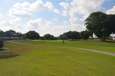 Experience serenity in this stunning 1-bedroom, 1-bathroom on Jacaranda Golf Club in Florida - for sale on GolfHomes.com, golf home, golf lot