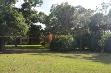 Experience serenity in this stunning 1-bedroom, 1-bathroom on Jacaranda Golf Club in Florida - for sale on GolfHomes.com, golf home, golf lot