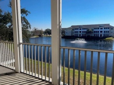 This ideal second floor condo has a sweeping view of the lake on Manatee County Golf Course in Florida - for sale on GolfHomes.com, golf home, golf lot