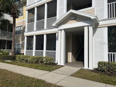 This ideal second floor condo has a sweeping view of the lake on Manatee County Golf Course in Florida - for sale on GolfHomes.com, golf home, golf lot