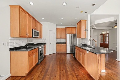 Welcome to this beautiful end unit townhome with a 1st Floor on Heritage Golf Club in North Carolina - for sale on GolfHomes.com, golf home, golf lot