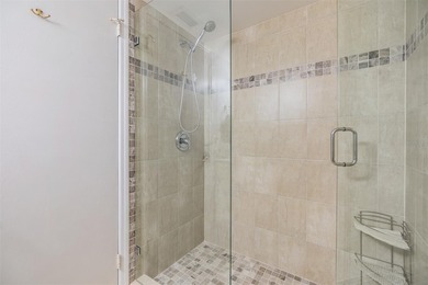 Welcome to this exclusive deluxe two bedroom, two bath corner on Cove Cay Country Club in Florida - for sale on GolfHomes.com, golf home, golf lot