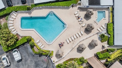 Welcome to this exclusive deluxe two bedroom, two bath corner on Cove Cay Country Club in Florida - for sale on GolfHomes.com, golf home, golf lot