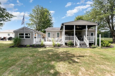 Welcome to your serene retreat in the prestigious Perry Park on Perry Park Golf Resort in Kentucky - for sale on GolfHomes.com, golf home, golf lot
