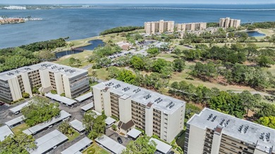 Welcome to this exclusive deluxe two bedroom, two bath corner on Cove Cay Country Club in Florida - for sale on GolfHomes.com, golf home, golf lot