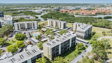 Welcome to this exclusive deluxe two bedroom, two bath corner on Cove Cay Country Club in Florida - for sale on GolfHomes.com, golf home, golf lot