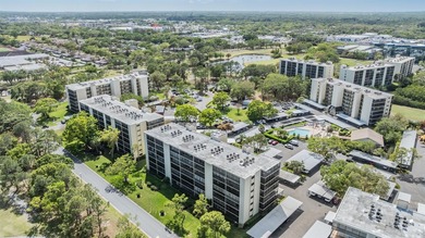 Welcome to this exclusive deluxe two bedroom, two bath corner on Cove Cay Country Club in Florida - for sale on GolfHomes.com, golf home, golf lot