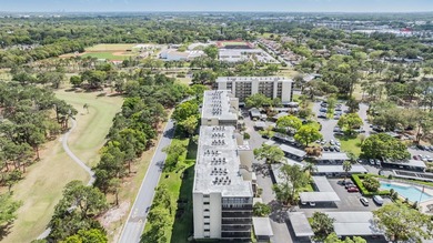Welcome to this exclusive deluxe two bedroom, two bath corner on Cove Cay Country Club in Florida - for sale on GolfHomes.com, golf home, golf lot