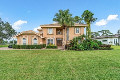 Spacious 5-bedroom, 4-bath, two-story home on a 1-acre lot in on PGA National Estates Golf Course in Florida - for sale on GolfHomes.com, golf home, golf lot