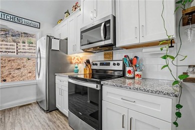 Enjoy peaceful living in this charming 2-bedroom, 2-bath home on The Highlands Course at Lake Arrowhead in Georgia - for sale on GolfHomes.com, golf home, golf lot