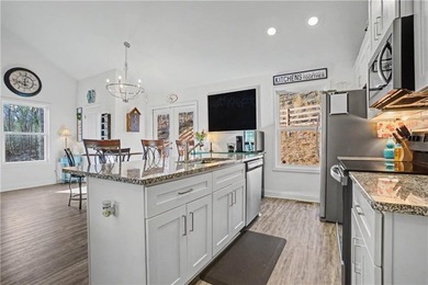 Enjoy peaceful living in this charming 2-bedroom, 2-bath home on The Highlands Course at Lake Arrowhead in Georgia - for sale on GolfHomes.com, golf home, golf lot