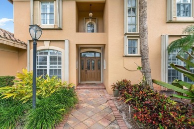 Spacious 5-bedroom, 4-bath, two-story home on a 1-acre lot in on PGA National Estates Golf Course in Florida - for sale on GolfHomes.com, golf home, golf lot