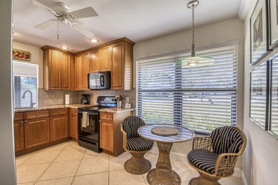 Welcome home to this delightful, bright and updated home in on Old Marsh Golf Club in Florida - for sale on GolfHomes.com, golf home, golf lot