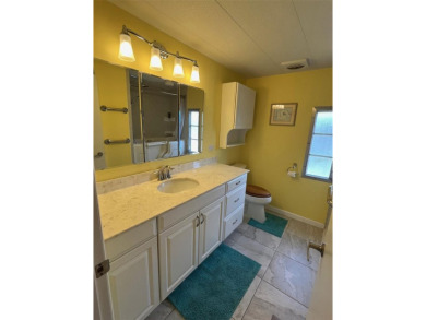 Palm Hill Country Club is a vibrant, 55+ golf and tennis on Palm Hill Golf Club in Florida - for sale on GolfHomes.com, golf home, golf lot