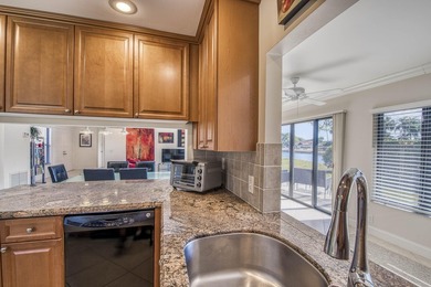 Welcome home to this delightful, bright and updated home in on Old Marsh Golf Club in Florida - for sale on GolfHomes.com, golf home, golf lot