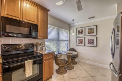 Welcome home to this delightful, bright and updated home in on Old Marsh Golf Club in Florida - for sale on GolfHomes.com, golf home, golf lot